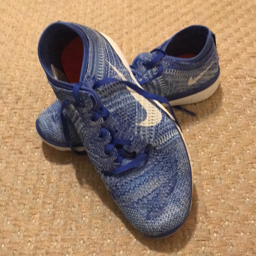 Nike Blue Flyknit Sneakers Size 7.5 women’s